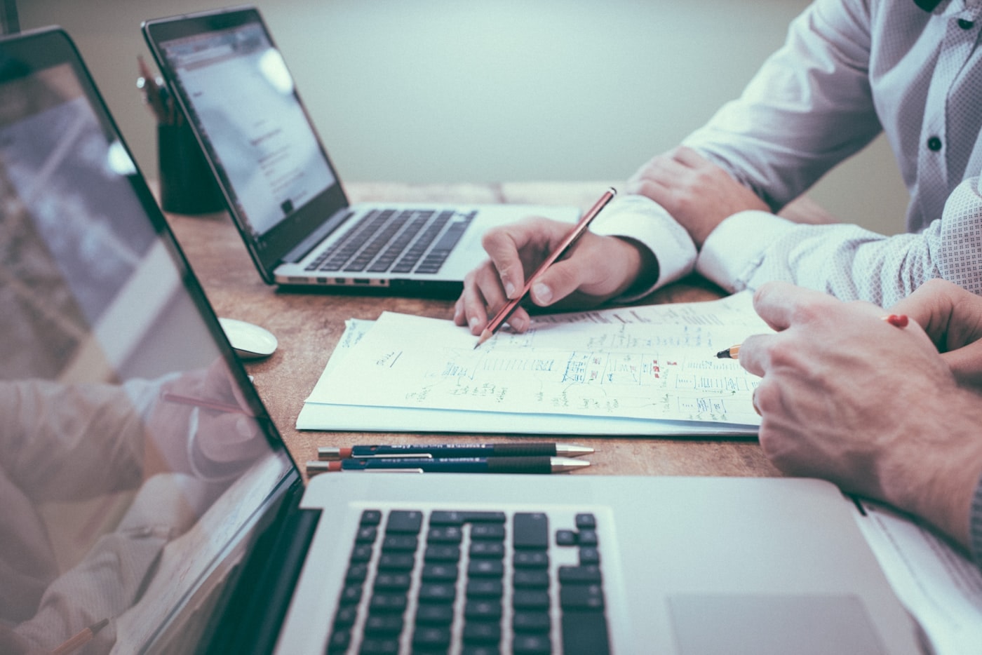 Business documents and laptop — chemical sourcing